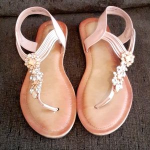 these shoes are in great condition and in the shade champange pink.
